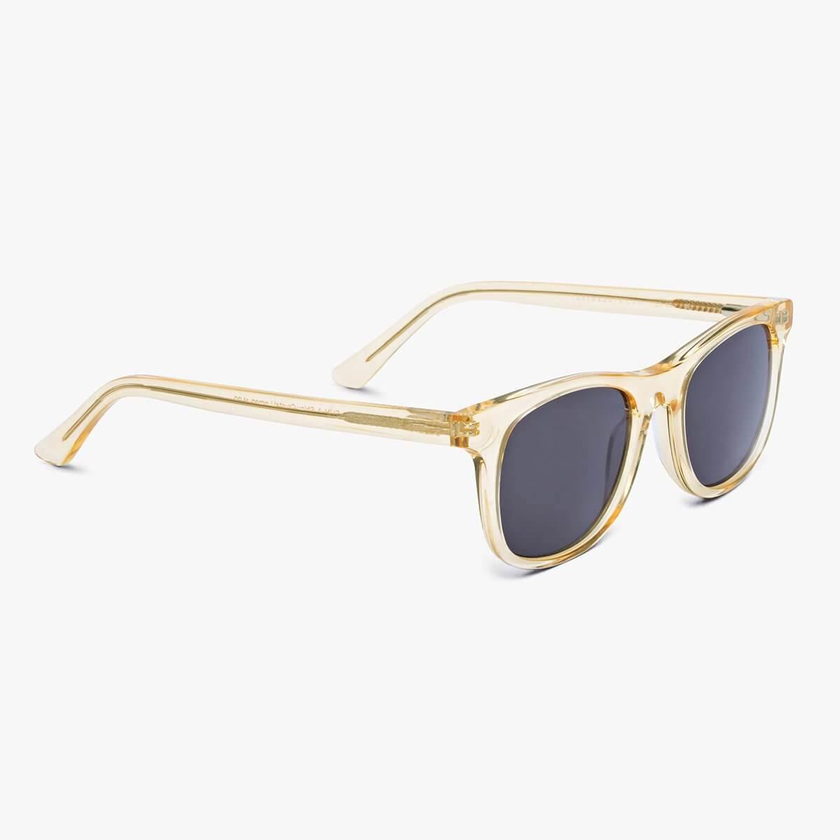 Crystal lemon sunglasses with dark lenses and clear frames