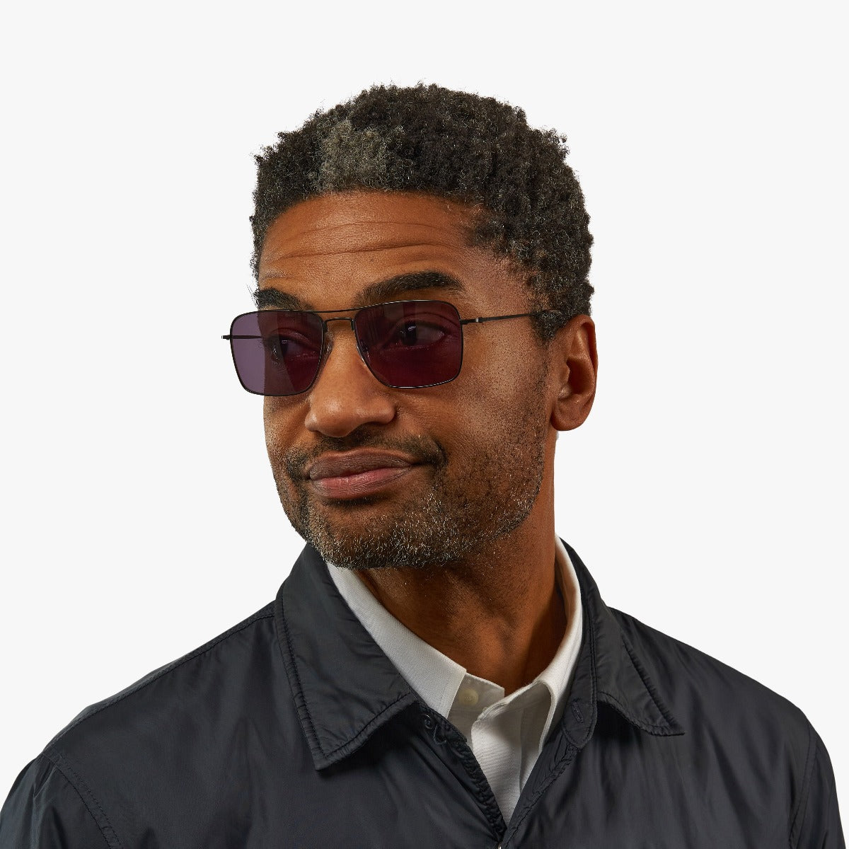 Person wearing Men's Lidköping Black sunglasses with square black frames