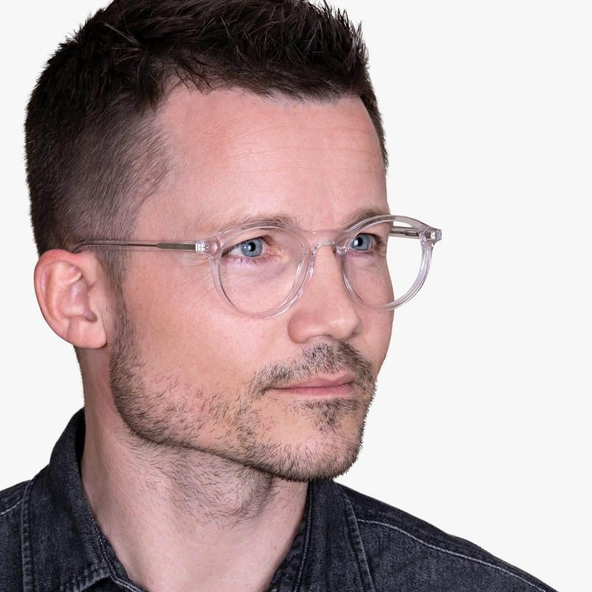 Person wearing Men's Løkken Crystal White glasses