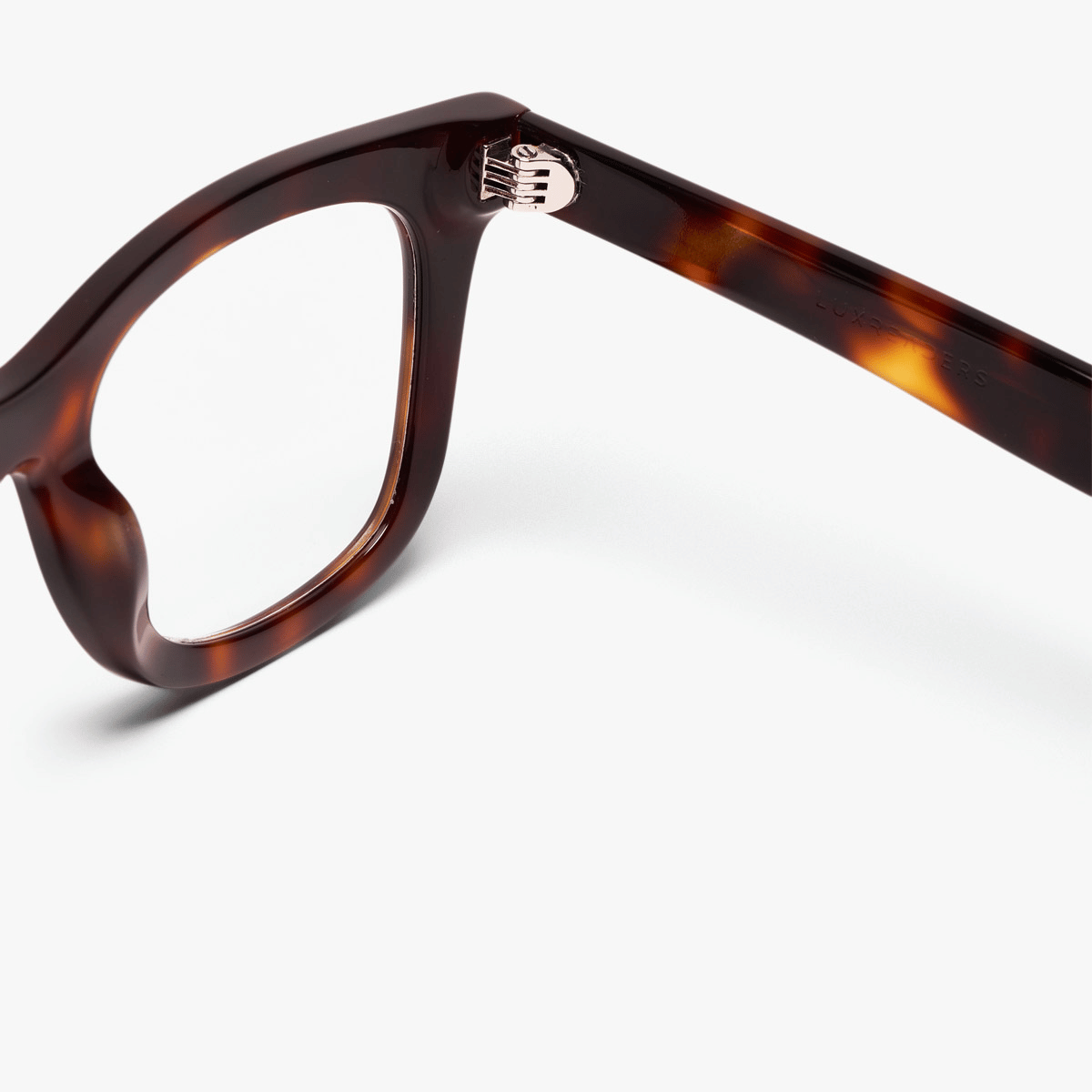 Men's dark tortoiseshell glasses frame with 'Luxreaders' engraved on the arm
