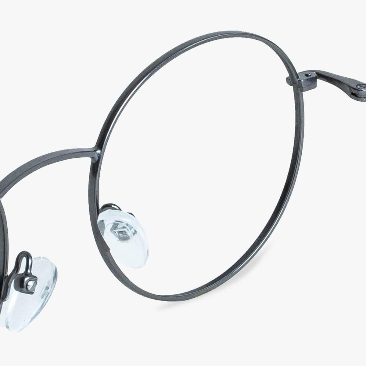 Round frame glasses with gunmetal finish and clear nose pads