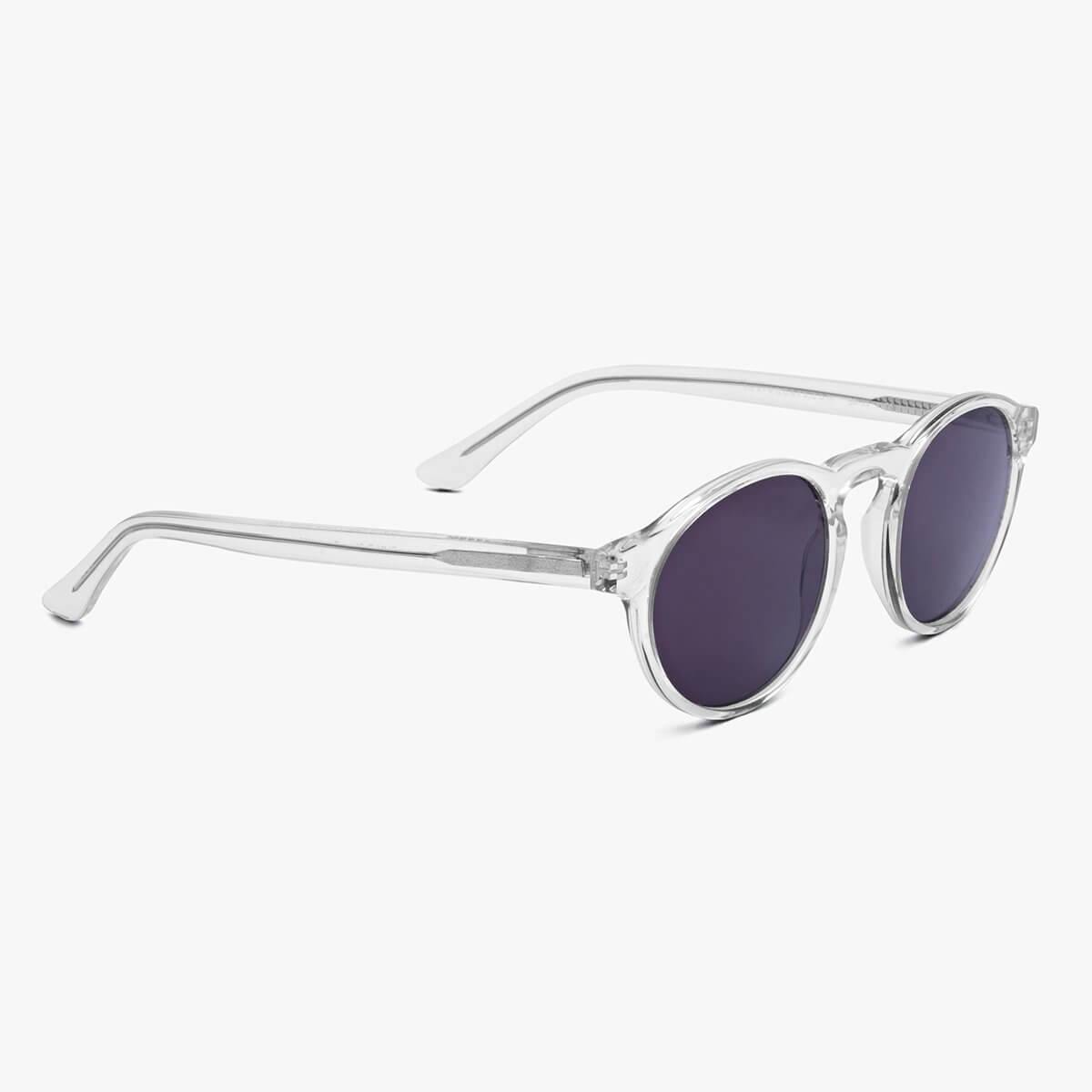 Trondheim Crystal White round sunglasses with clear frames and dark lenses