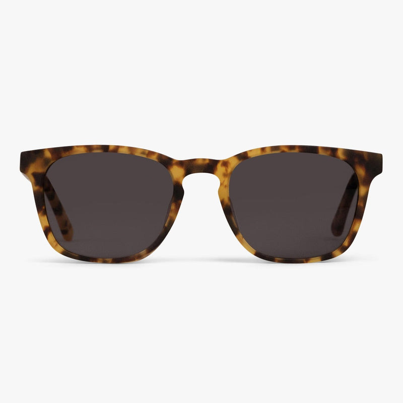 Tortoiseshell sunglasses with dark lenses
