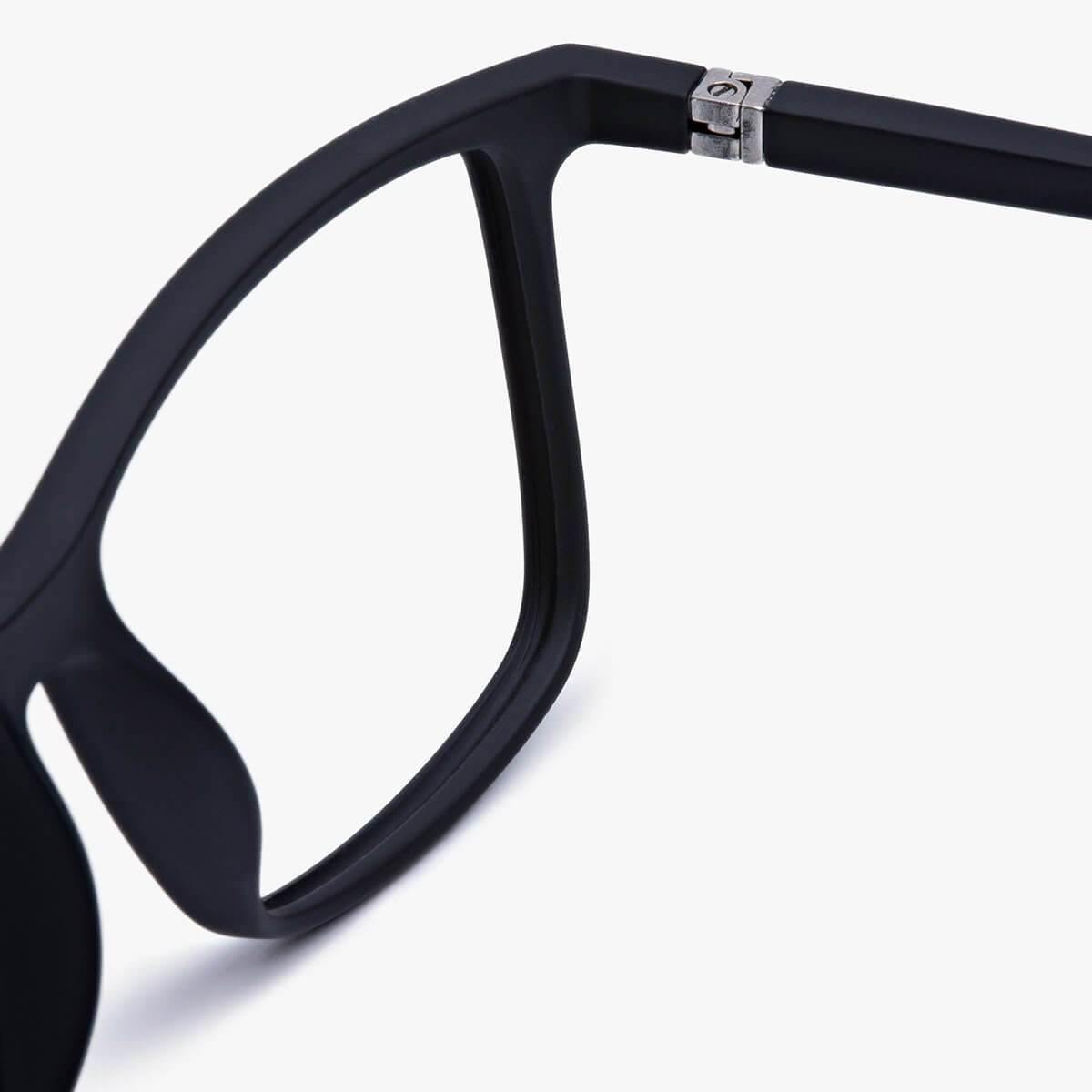 Close-up of black acetate eyewear hinge detail