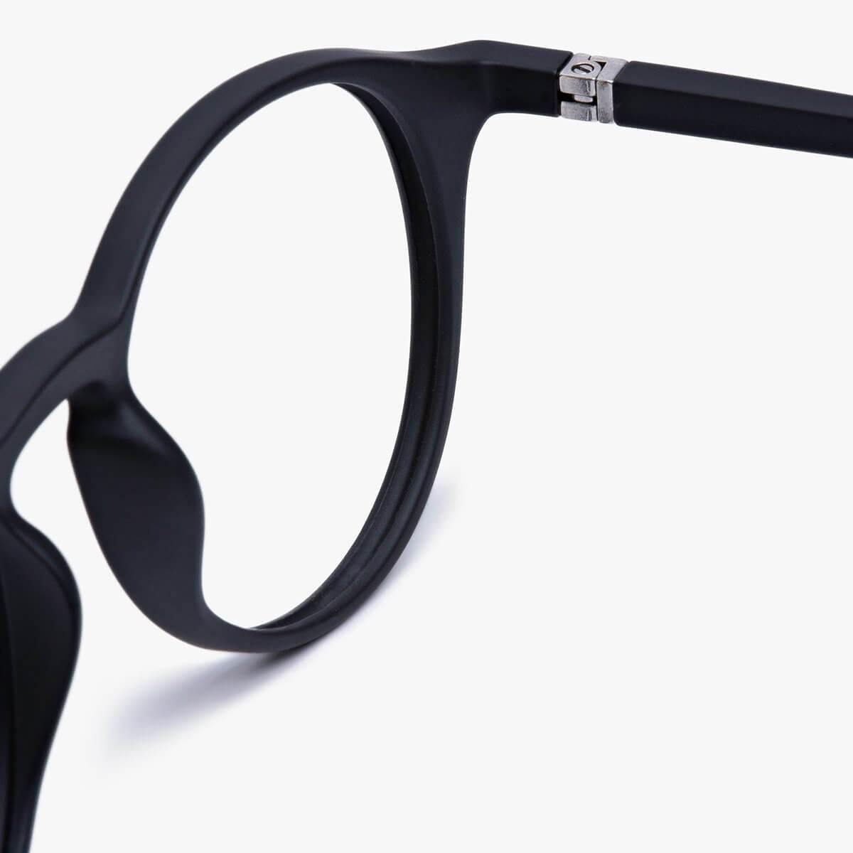 Close-up of Women's Læsø Black glasses with matte black frame and metal hinge